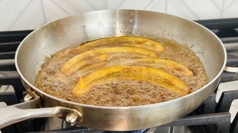 Flambeeing Bananas Foster in pan