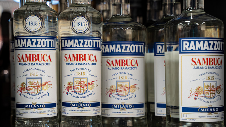 Bottles of sambuca are seen on a store shelf.