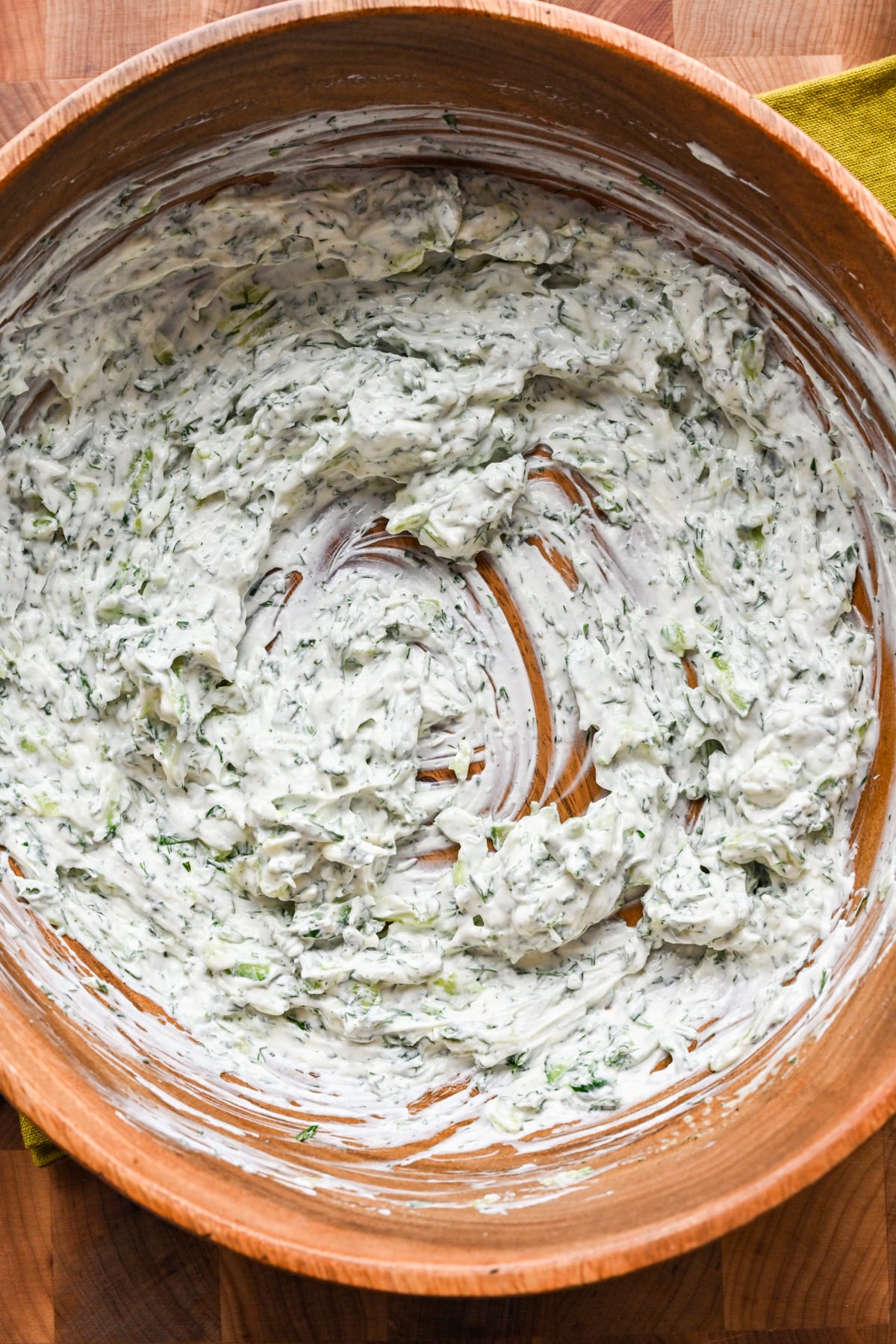 Ingredients for the tzatziki dressing mixed in a bowl.