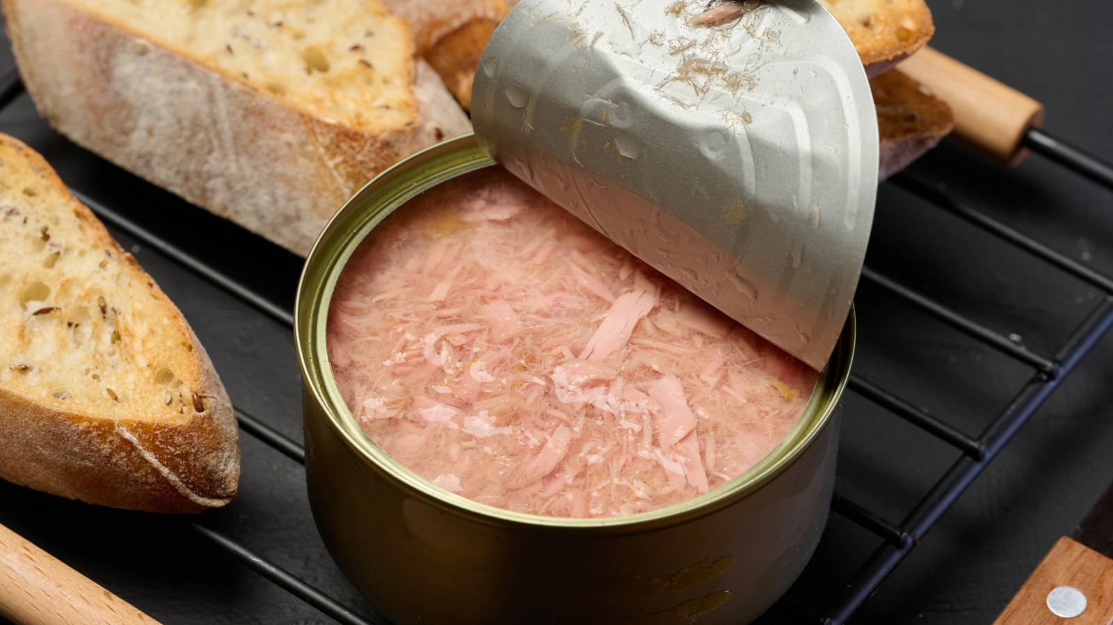 Don't Toss Those Old Tuna Cans! Here's How To Turn Them Into Adorable DIY Planters

