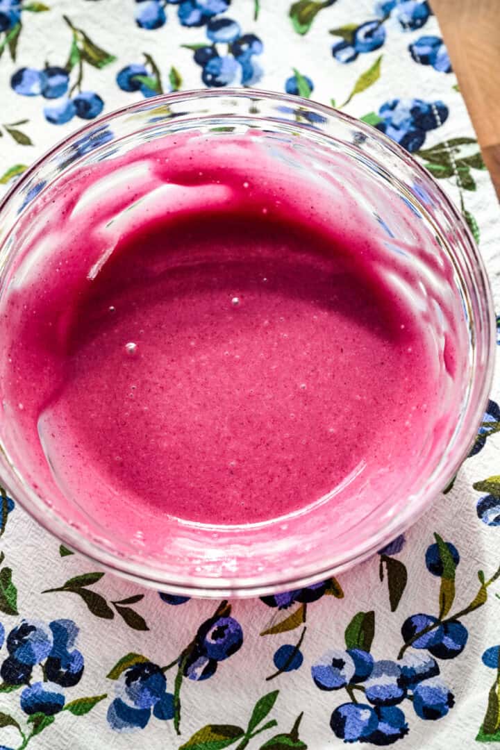 Blueberry glaze in a small bowl.