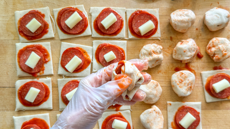 hand rolling into ball