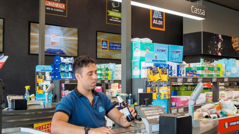Why Aldi Cashiers Sit Down At The Registers


