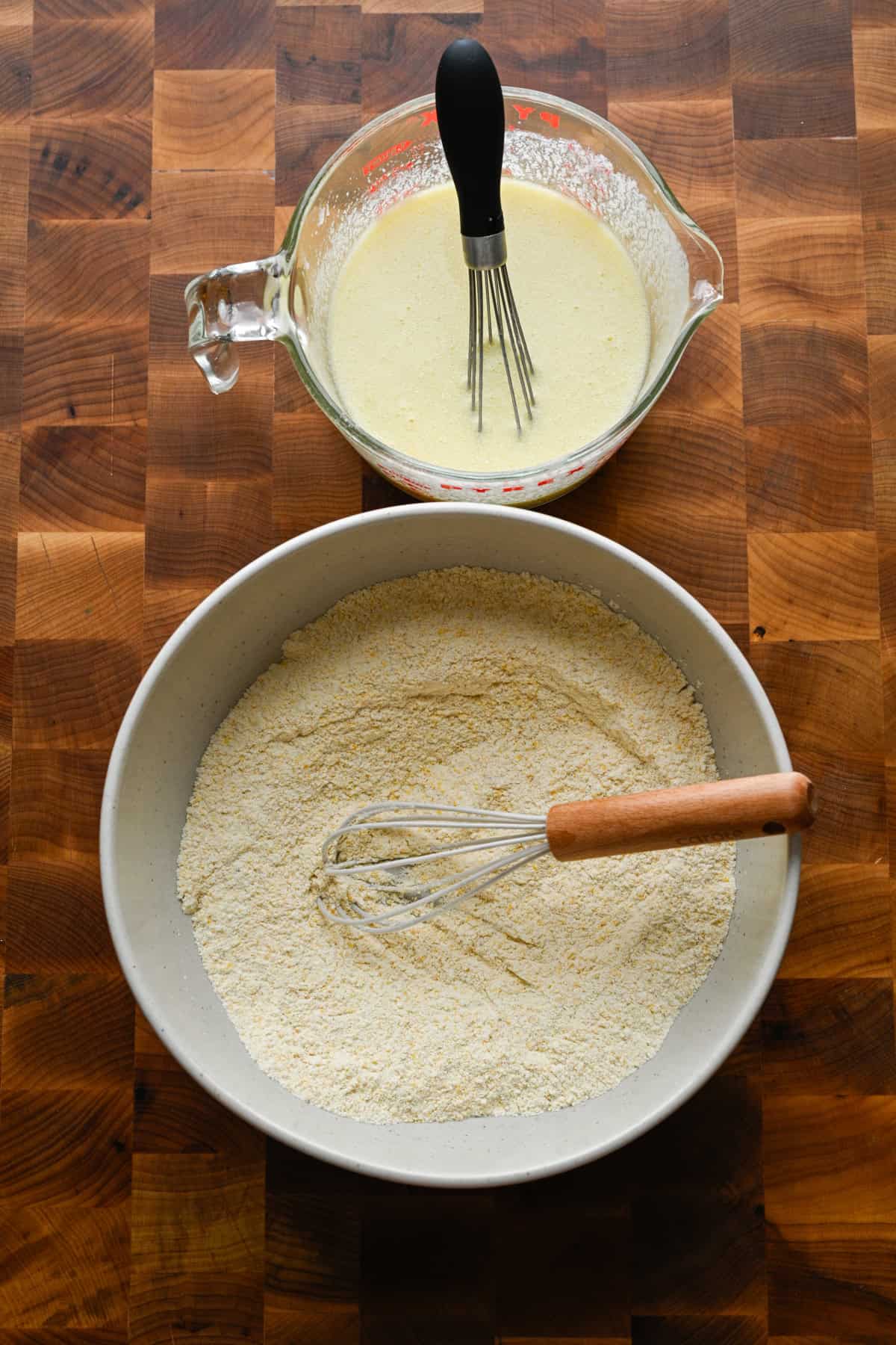Wet and dry ingredients prepared for the cornbread.