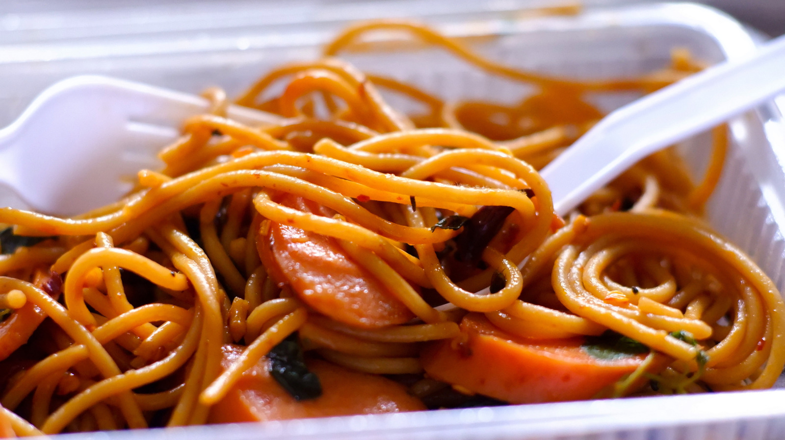 The Dangerous Cost Of Storing Oily Foods Inside Plastic Containers


