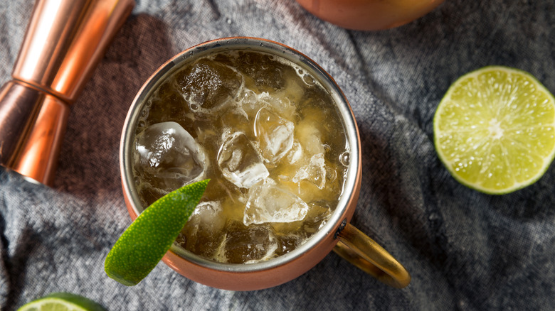 Overhead view of a mezcal mule cocktail in a copper mug
