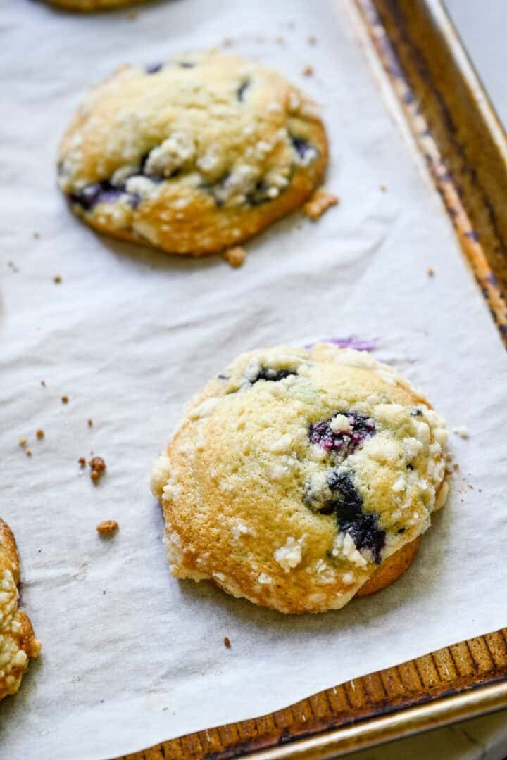 Overhead view of muffin on a parchment-lined sheet pan.