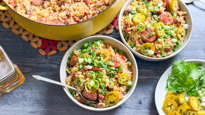 two bowls of One-Pot Red Beans And Rice on a gray wooden table