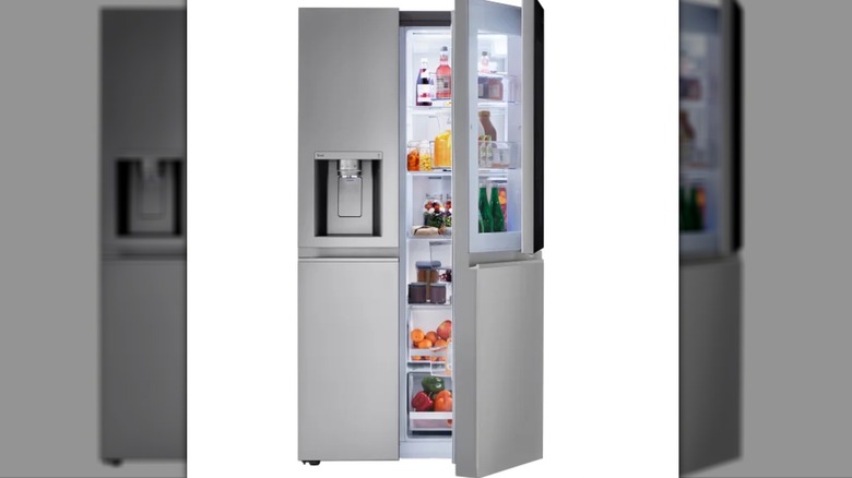 open refrigerator with food inside of it