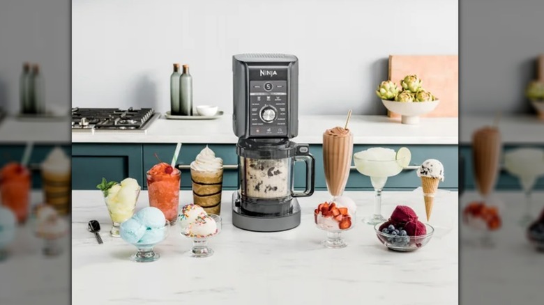 ice cream maker surrounded by different frozen treats