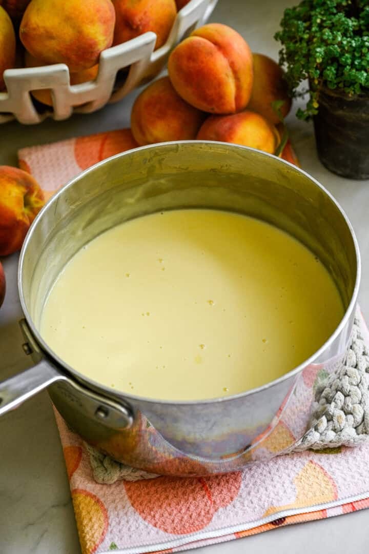 Ice cream custard in a stainless steel saucepan.