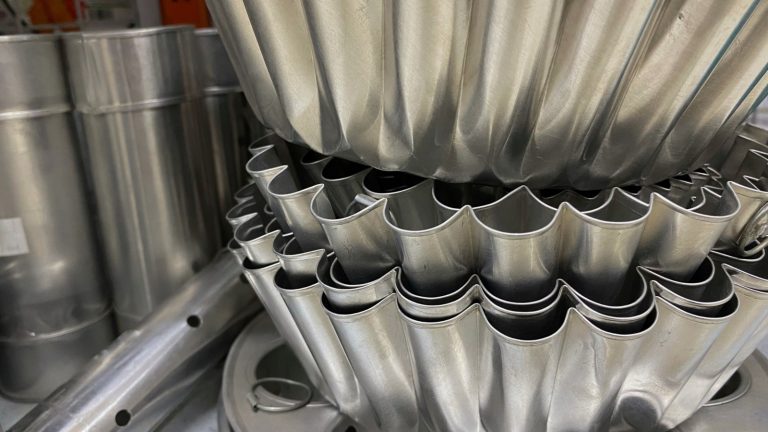Save Your Cabinet Space: Stack Cake Pans This Way For Easier Access And More Room

