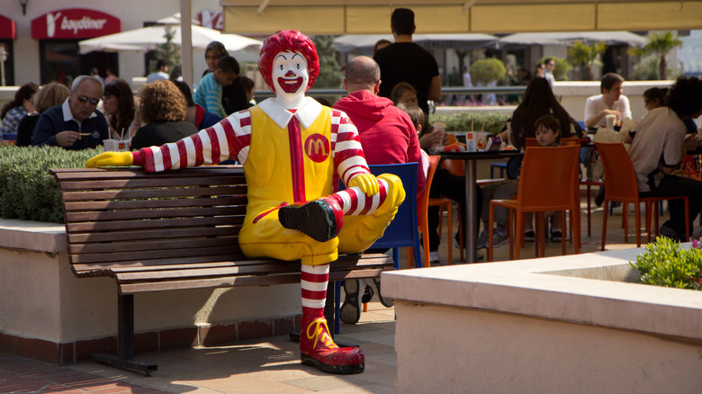 Ronald McDonald on bench