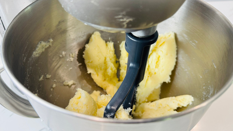Butter and sugar mixture in stand mixer with paddle attachment