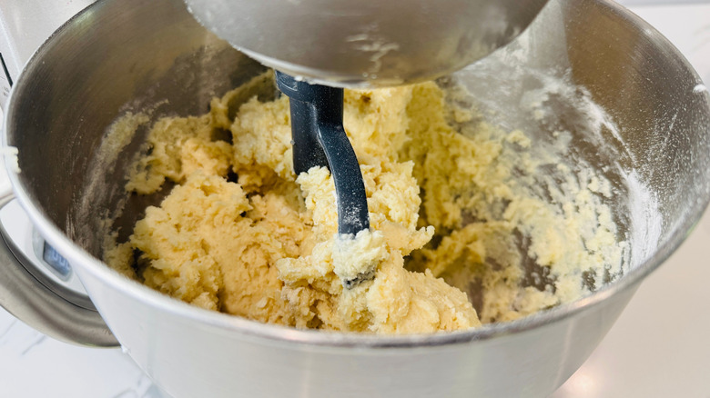 Cake batter in stand mixer bowl with paddle attachment