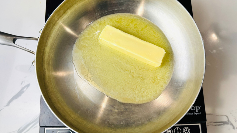 Butter melting in skillet