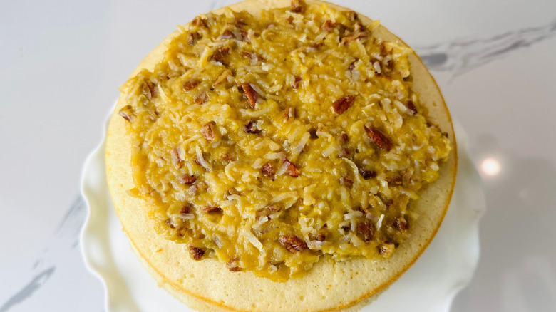 Cake topped with pecan coconut filling
