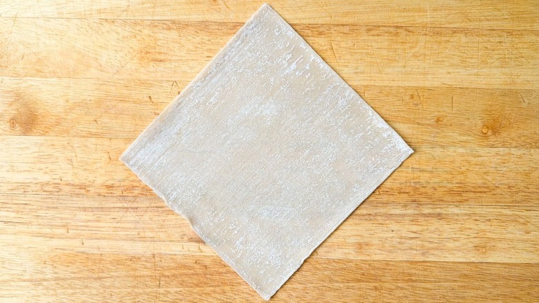 Egg roll wrapper on cutting board