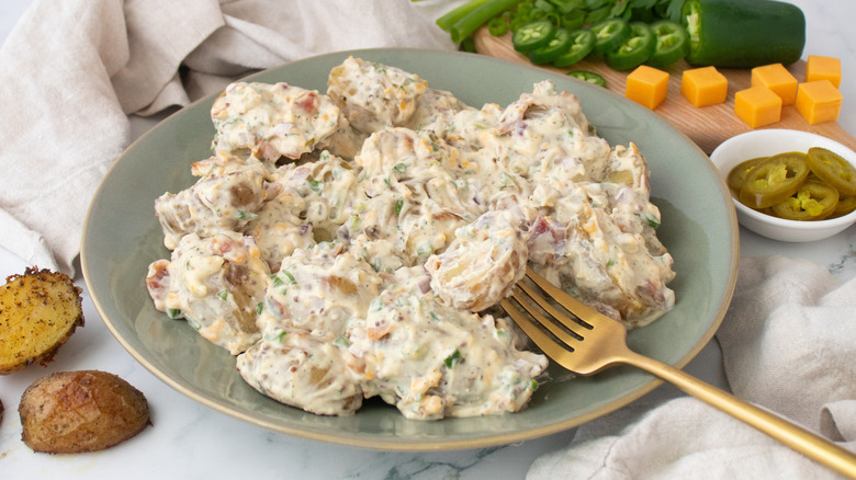Jalapeño popper potato salad on plate with fork