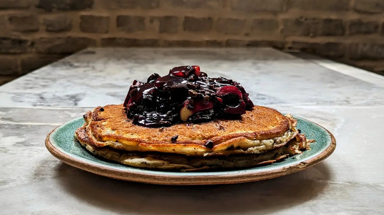 A plate of cherry chocolate pancakes art Bearcat