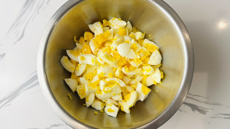 Chopped hard boiled eggs in bowl