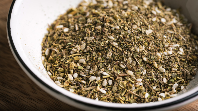 A bowl full of zaatar, close up.