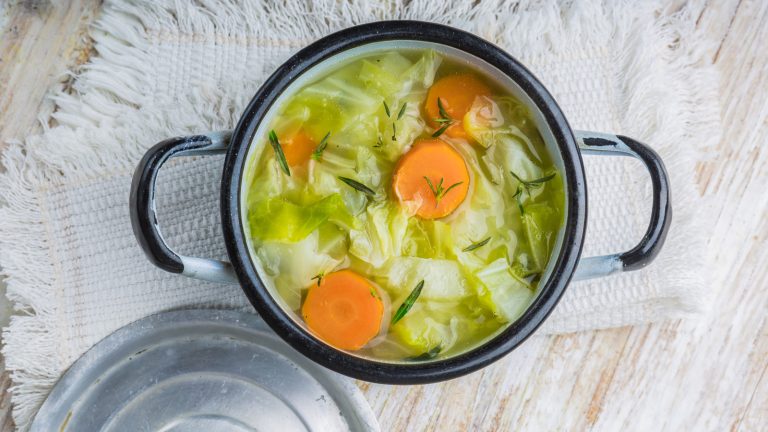 A Splash Of This Pantry Staple Takes Cabbage Soup To New Heights


