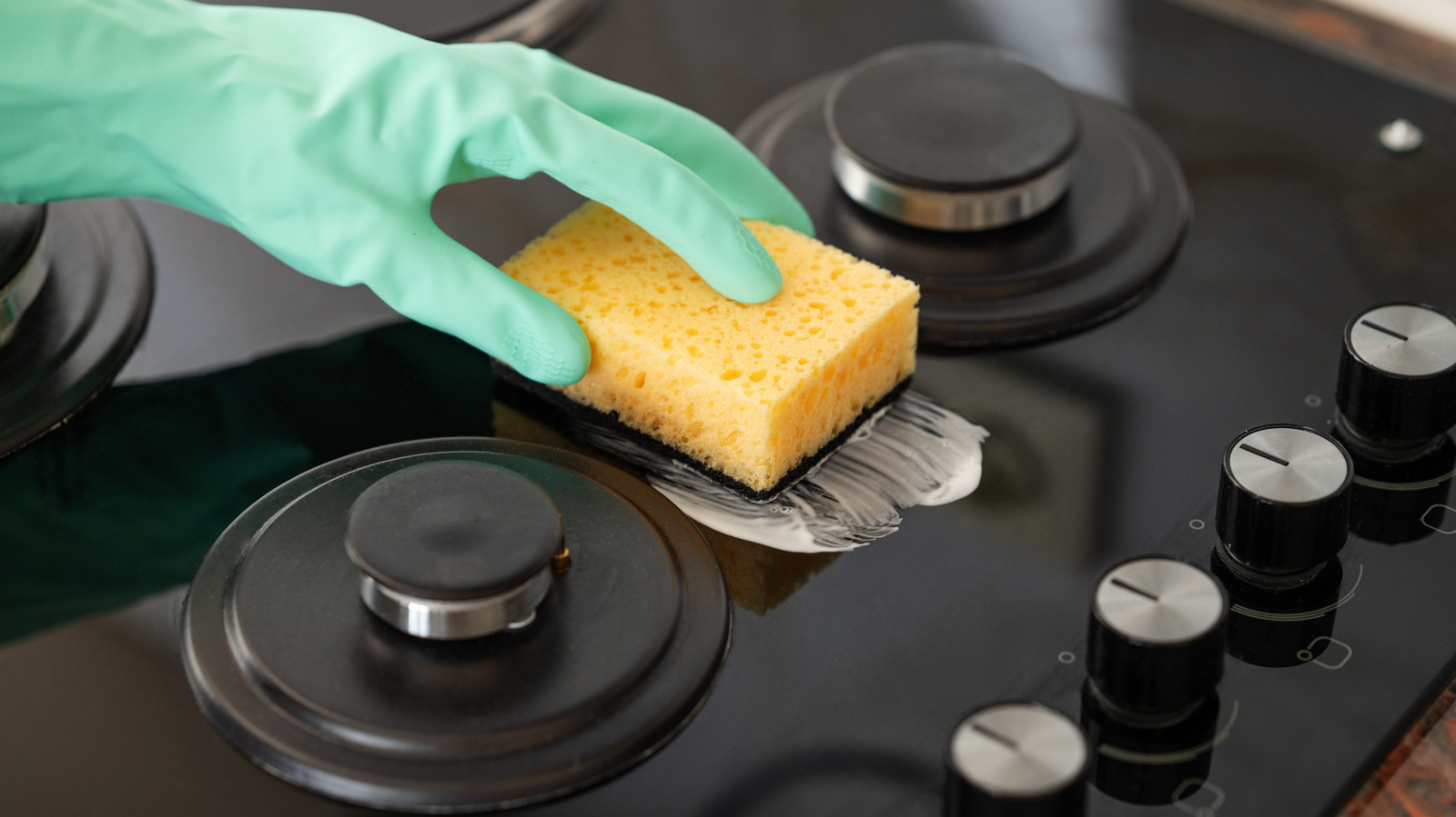 This Ingredient Erases Grease From Your Stovetop With Way Less Effort Than Scrubbing

