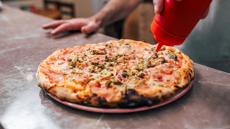 Ketchup On Pizza? Believe It Or Not, It's Common Across The Globe

