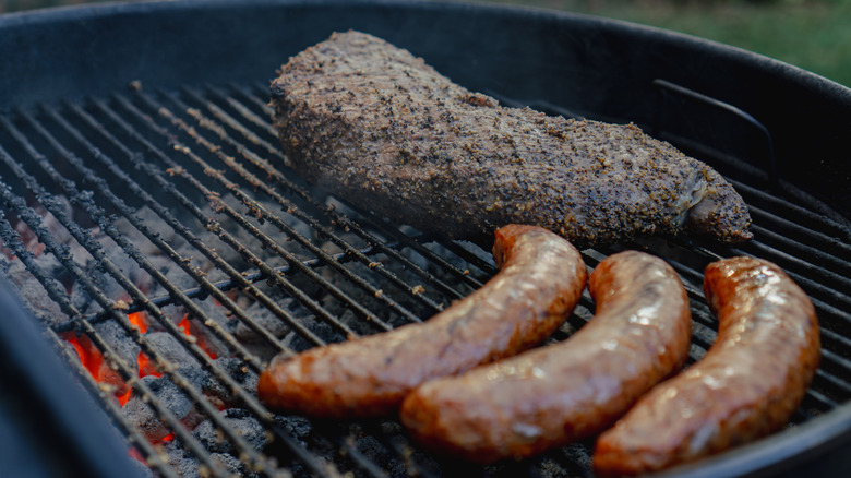 Cooking multiple types of meat on a charcoal grill