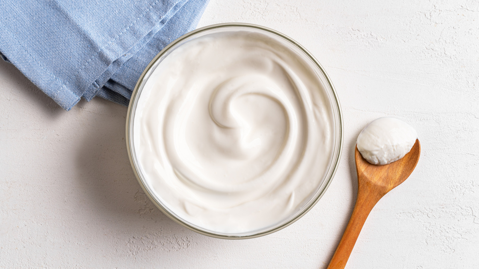 Don't Toss The Liquid Sitting On Top Of Yogurt — Stir It In For A Probiotic Boost Instead

