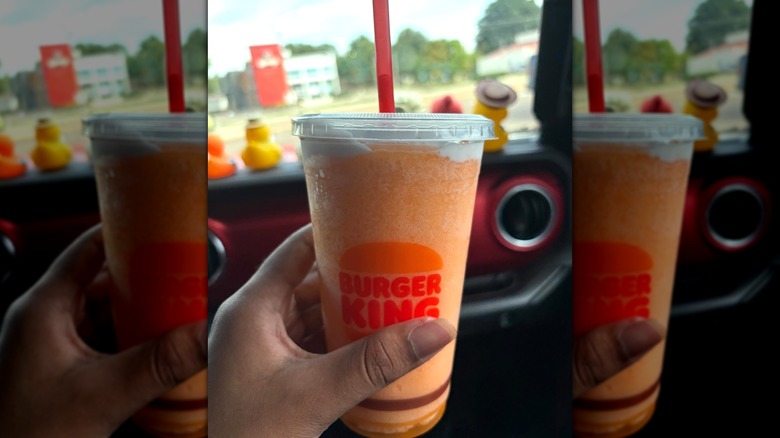 Hand holding Burger King Orange Dreamsicle Freezee King