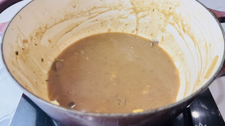 Gravy-like beef sauce in Dutch oven