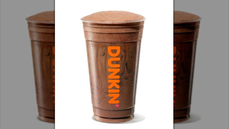 Toxic Ex-Presso Cloud Latte in Dunkin' clear plastic cup on a white background