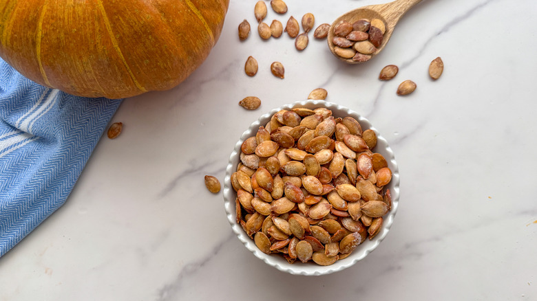 Roasted pumpkin seeds in bowl