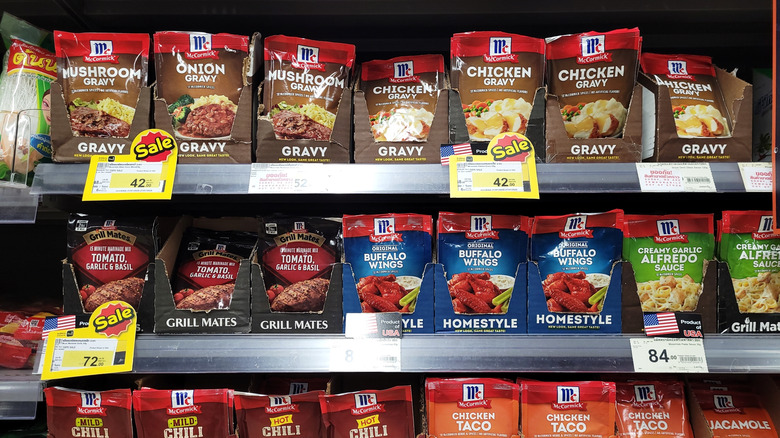 Packages of McCormick gravy and seasoning mixes on store shelves