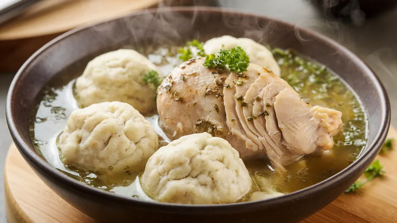 A bowl of chicken and dumplings.