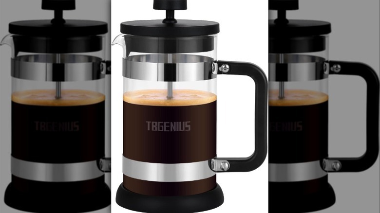 TBGENUIS French press halfway full of brewed coffee with a thin layer of foam on top