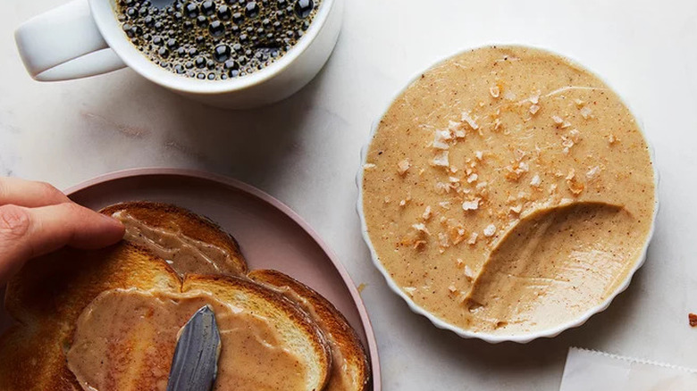 Dish of apple butter with toast and coffee