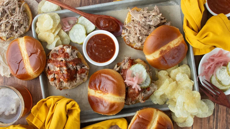 Pulled pork sandwiches on a board