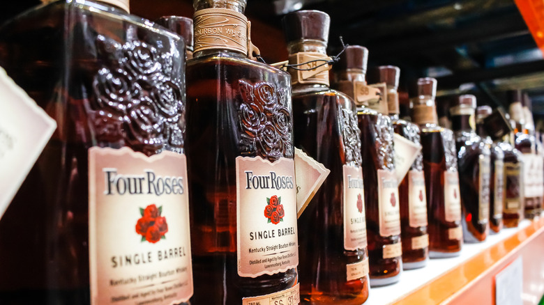 Bottles of Four Roses bourbon on a shelf at a Costco