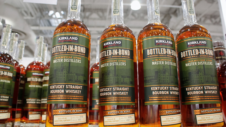 Bottles of Kirkland Signature Bottled-in-Bond bourbon at a Costco