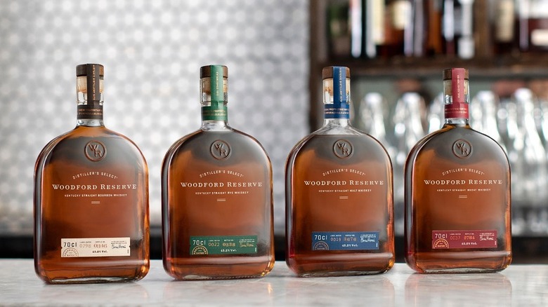 Bottles of Woodford Reserve bourbon on a bar