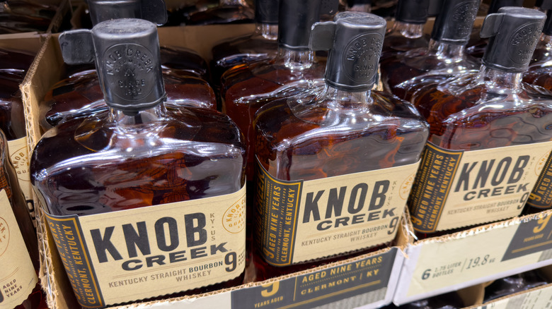 Bottles of Knob Creek bourbon in cases at a Costco