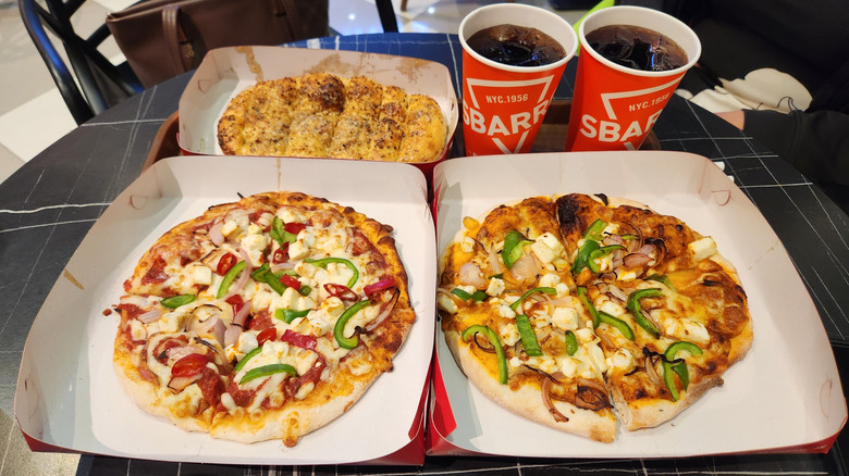 Sbarro pizzas and drinks
