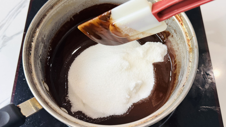 Melted chocolate and sugar in bowl