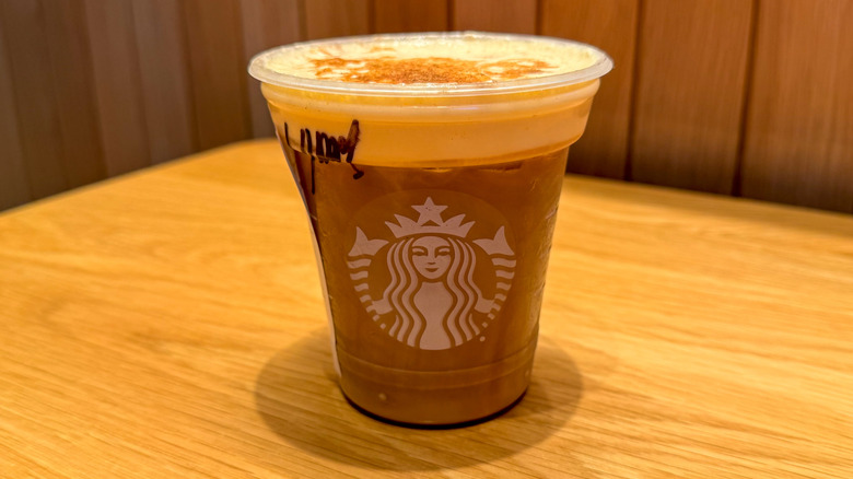 Iced Pecan Crunch Latte on a table