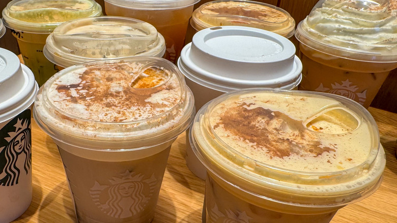 Starbucks cups on a table