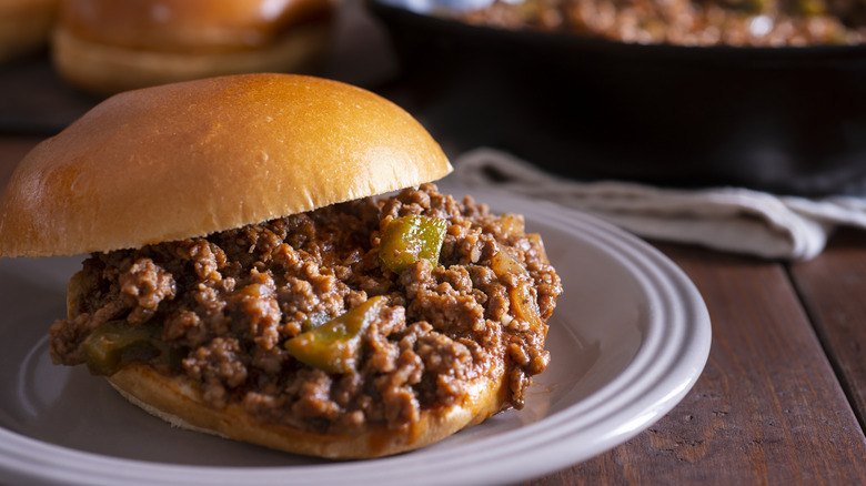 A Sloppy Joe sits on a plate