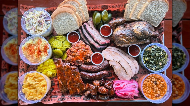 A tray of meats and sides from Offset Smoker BBQ